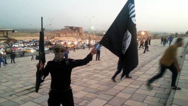 An Isis fighter in Iraqi city of Mosul pictured in June 23.