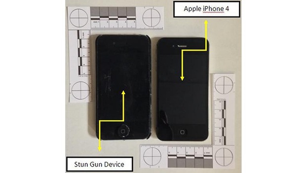 The stun gun, left, compared to an Apple iPhone 4.