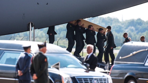 The coffins were carried from the plane during an official reception ceremony in the Netherlands after MH17 downed over rebel-held territory in eastern Ukraine.