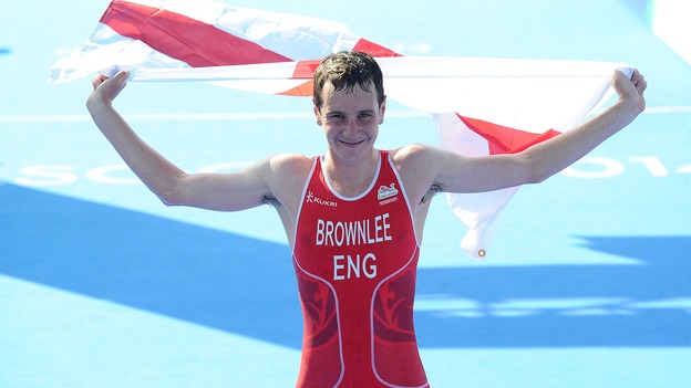 England's Alistair Brownlee celebrates after winning the men's triathlon