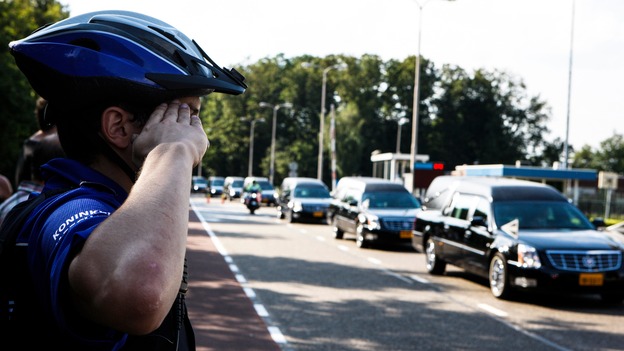 Policeman salutes