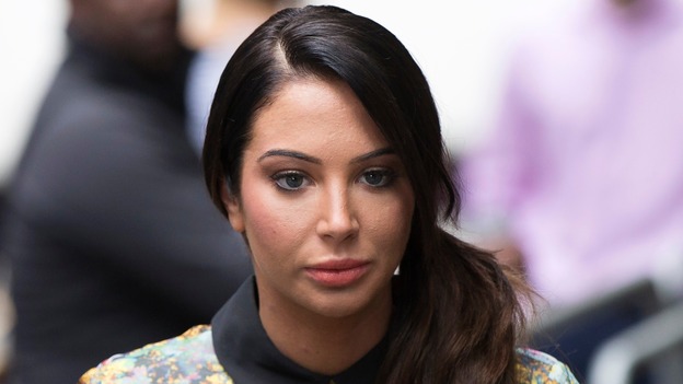 Former X Factor judge Tulisa will learn her fate over an alleged assault at last year's V Festival.
