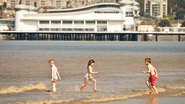 Children playing in the sea at Weston
