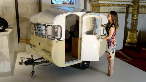 A miniature caravan presented to Prince Charles and Princess Anne by the Caravan Club.