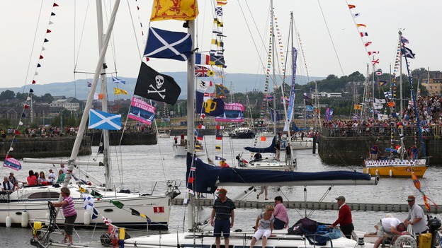 Thousands watched as the flotilla sailed through Glasgow.
