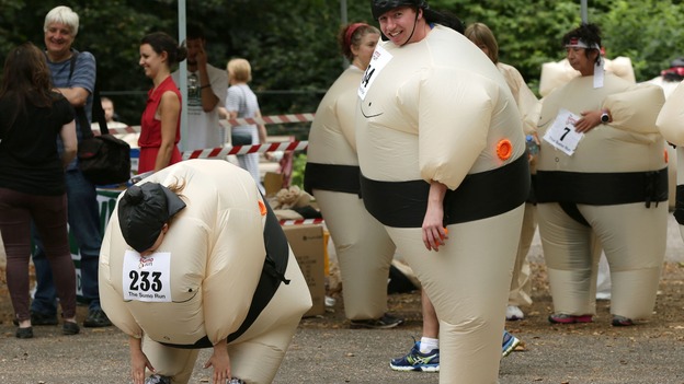 Sumo runners warming up.