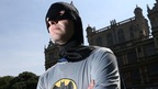 'Batman' says his aim is to save people from misery by putting a smile on their faces.