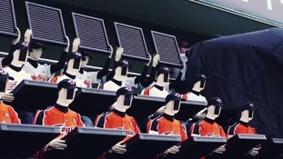 Virtual robots have been installed at South Korea's Hanhwa Eagles stadium to help fans support the team.