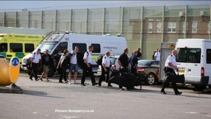 Specially trained guards prepare to go into Ranby prison to quell trouble