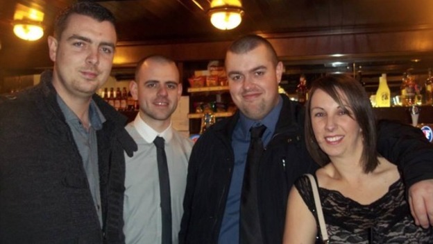Liam - second from right - with family.