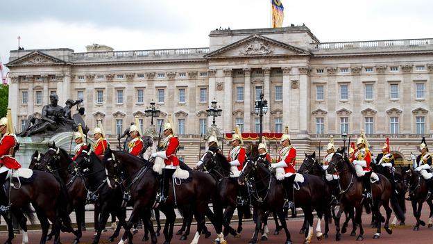 The Queen's Guards passing Buckingham Palace on horse back during the Trooping of the Colour