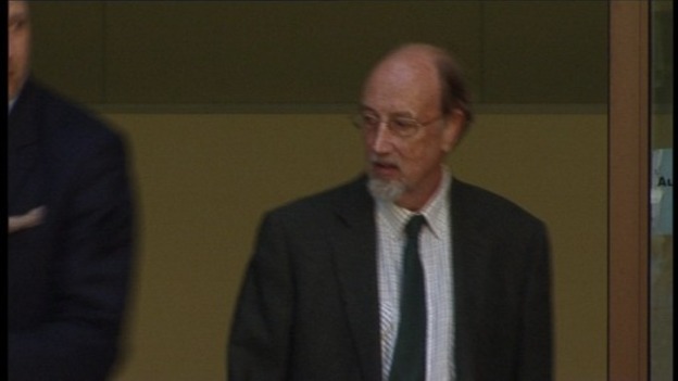 Charles Napier arriving at court