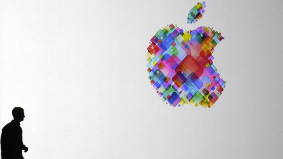Apple CEO Tim Cook enters the stage during the Apple Developers Conference