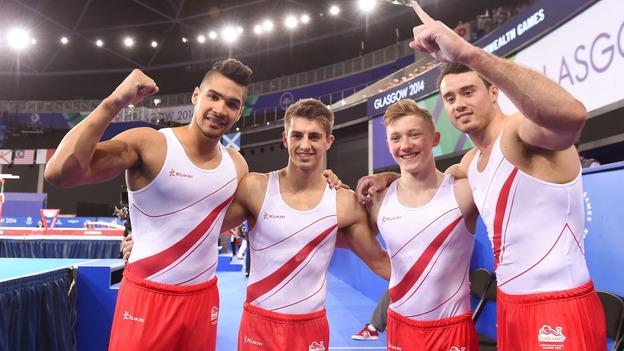 Team England win gold in gymnastics event.