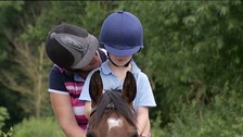 6-year-old Ollie Wilson at he Horshoes and Handprints charity