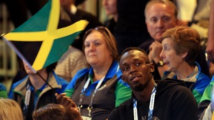 Jamaica's Usain Bolt watches the netball match between Jamaica and New Zealand in Glasgow.