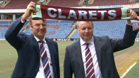 John Banaszkiewicz and Mike Garlick holding Burnley scarf
