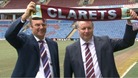 John Banaszkiewicz and Mike Garlick holding Burnley scarf