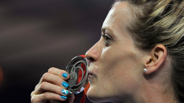 Scotland's Eilidh Child kisses her silver medal.