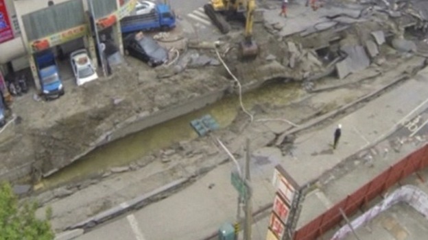 The series of explosions happened along pipelines and split the street open.