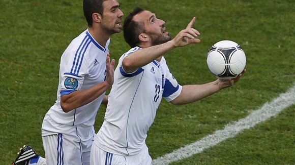 Theofanis Gekas (right) and Yiannis Maniatis celebrate Greece's goal.