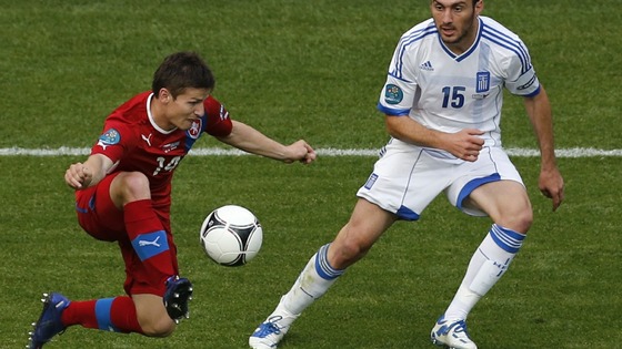 First-half goalscorer Vaclav Pilar controls the ball with Vasilis Torosidis in attendance.