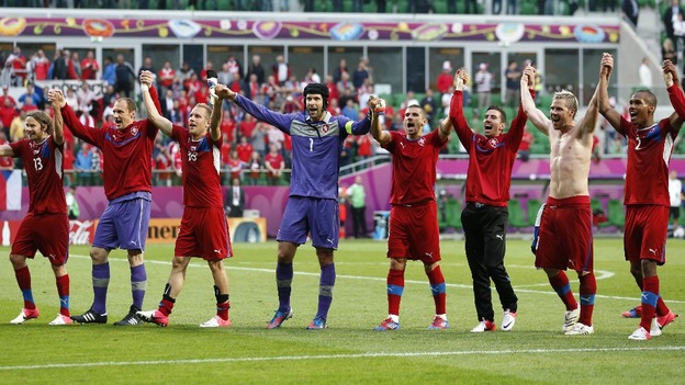 The Czech Republic players salute their fans after a crucial 2-1 win.