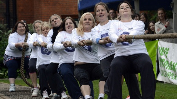 A team of female MPs also took part in a tug-of-war match