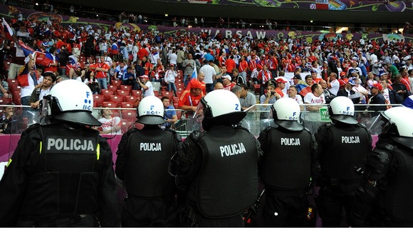 Polish riot police patrol Russia's fans
