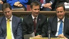 Culture Secretary Jeremy Hunt sits flanked by Prime Minister David Cameron and Deputy Prime Minister Nick Clegg.