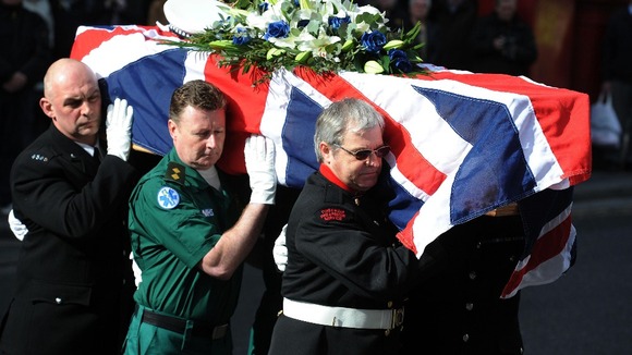 Six pallbearers from the police, fire and ambulance service carried PC Rathband's coffin through the cathedral.