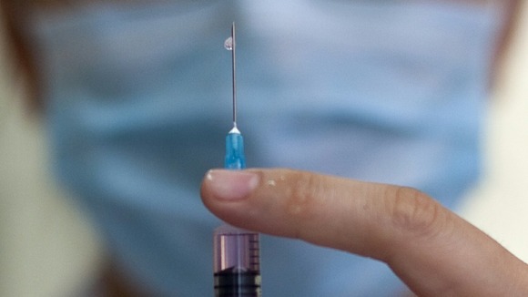 Nurse with needle