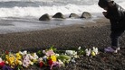 Girl prays for victims of the earthquake and tsunami in Iwaki