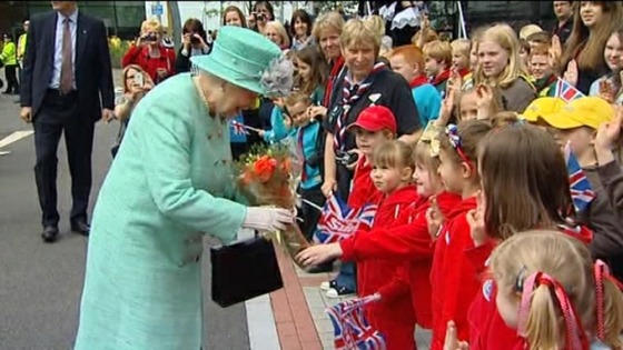 The people of Corby welcomed the Queen with an abundance of flowers and flags.