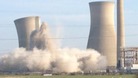 A series of controlled explosive charges were places around each tower