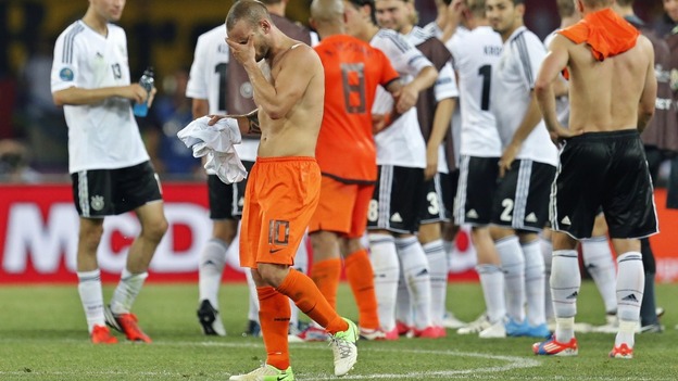 Wesley Sneijder looks dejected after the 2-1 loss to Germany.