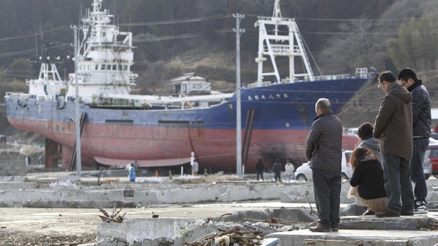 Moment of silence close to the 330 ton fishing vessel which was flung 800 meters inland from Kesennuma