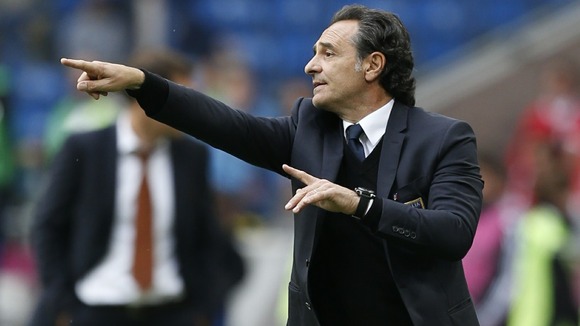 Italy coach Cesare Prandelli gives instructions during the Group C match in Poznan.