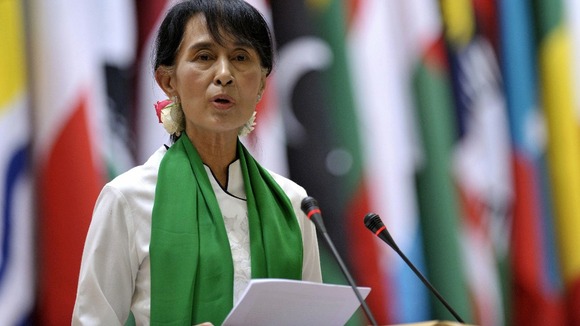 Aung San Suu Kyi moments before becoming ill at a press confernce in the Swiss capital of Bern and throwing up.