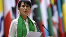 Aung San Suu Kyi moments before becoming ill at a press confernce in the Swiss capital of Bern and throwing up.
