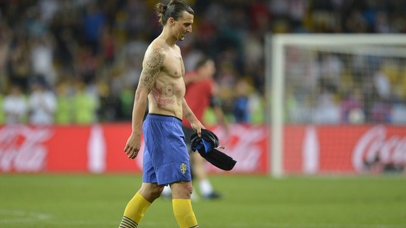 Sweden striker Zlatan Ibrahimovic looks dejected after defeat to England.