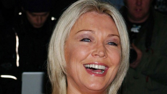 English actress Amanda Redman receives an MBE.