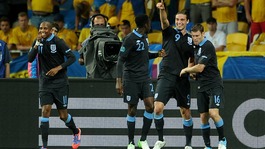Andy Carroll celebrates scoring England's opener in Kiev.