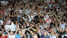 England fans celebrate their third goal scored by Danny Welbeck, in the stands