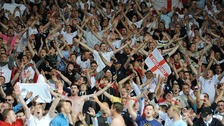 England fans celebrate their third goal scored by Danny Welbeck, in the stands