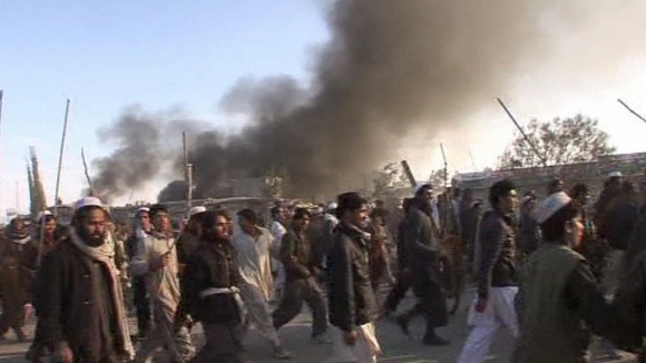 Protests in Afghanistan after reports that copies of the Koran were burned in an incinerator at Bagram airbase