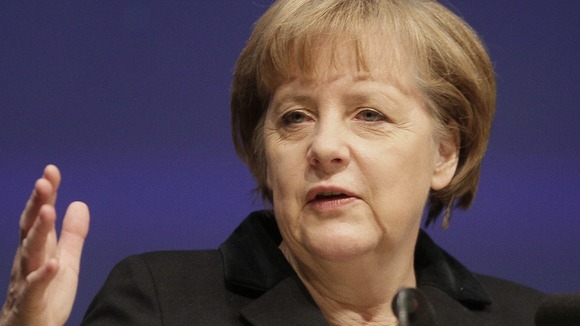 Angela Merkel warns Greece about bailout terms ahead of the country's elections