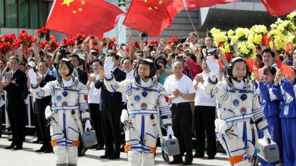Chinese astronauts Jing Haipeng, Liu Wang and Liu Yang