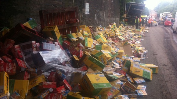 Thousands of Weetabix have spilled onto the side of the road after a lorry hit the bridge in Tipton