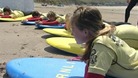 Children getting beach safety lessons